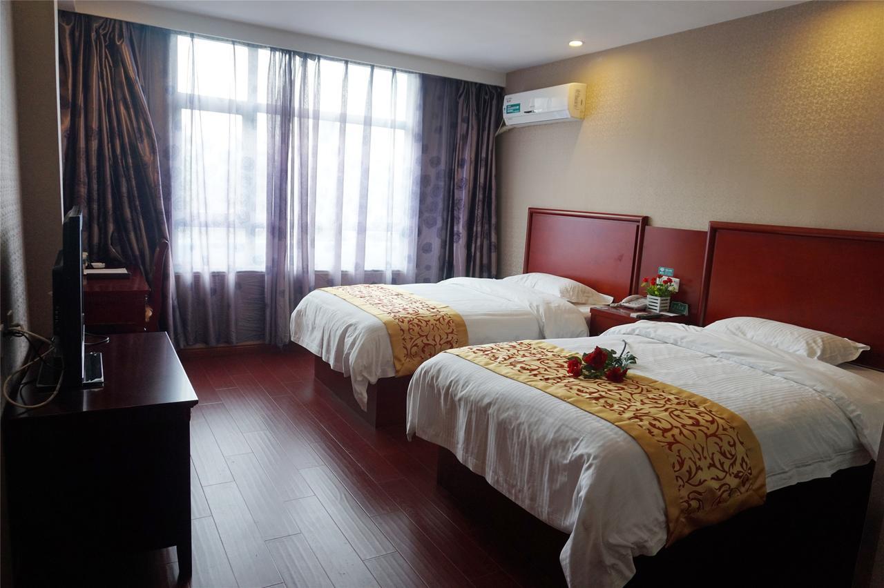 Shells Hanzhong City High Railway Station Renmin Road Hotel Buitenkant foto